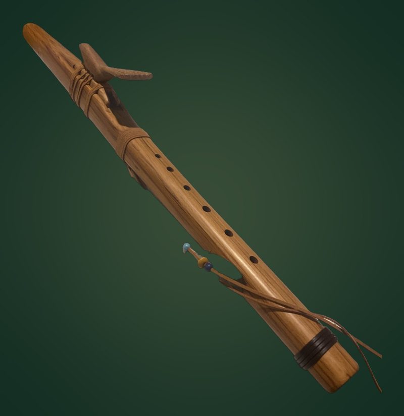 My Native American-style flute made by Mark, with leather ties and beads