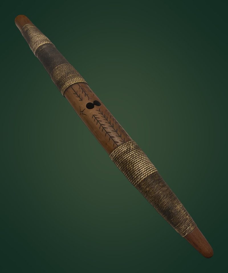 My carved pūtōrino, bound with fibre, gifted by Kiri